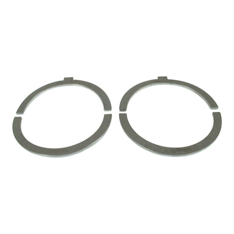 Two metal circlips with a gap, lying flat on a white background, next to a Thrust Bearings Set +0.005 (Sparex Part No.S.57537).