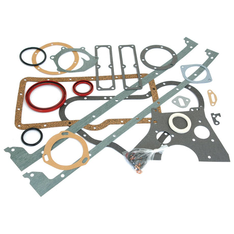 The Sparex Bottom Gasket Set - 6 Cyl. (Sparex Part No.S.57562) is a comprehensive collection of various automotive gaskets and seals, including ring, head, and shaped gaskets in multiple sizes and materials. Perfect for David Brown tractors with a 6 Cylinder engine, it also comes with a small bag of bolts for added convenience.