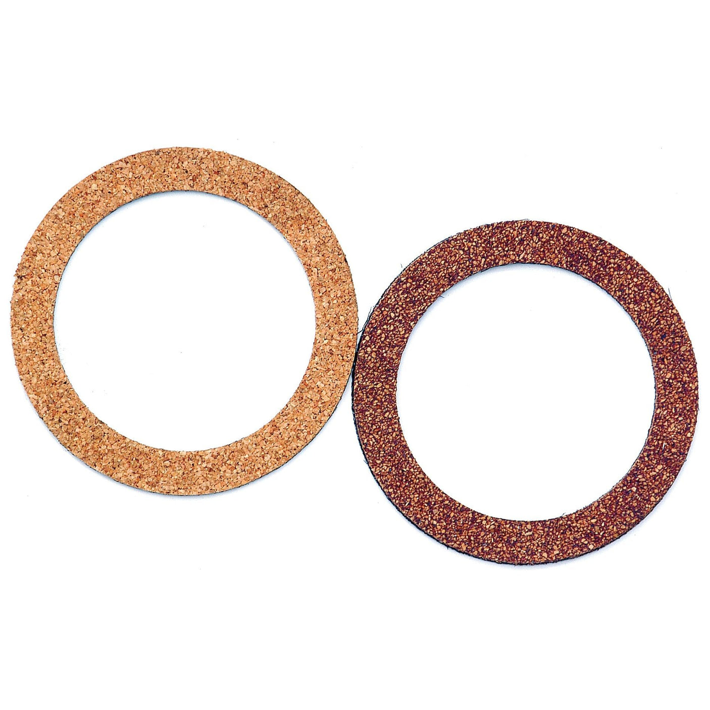 Two circular gaskets made of different materials, one being cork and the other a dark brown abrasive material, are displayed on a white background. These components might remind you of high-quality parts like the Sparex Oil Seal (Part No. S.58832) or the sturdy oil seals used in John Deere machinery.