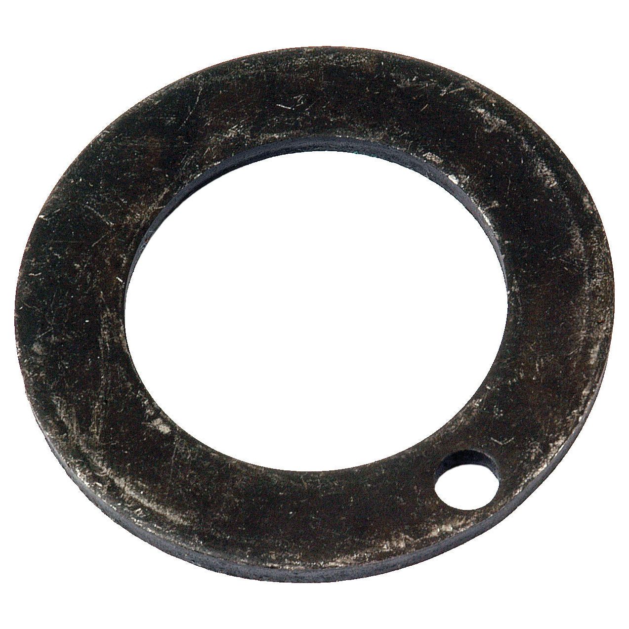 The Sparex Thrust Washer (Part No. S.59023) is a round, flat, black metal washer with a small hole near the edge, designed for use on an Allis Chalmers front axle.