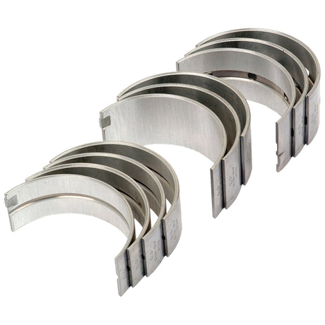 Image of a set of Sparex Main Bearings +0.010'' (0.25mm), specifically for the Fiat 411R, arranged in two rows, each consisting of multiple semi-circular components. Sparex Part No.S.59062