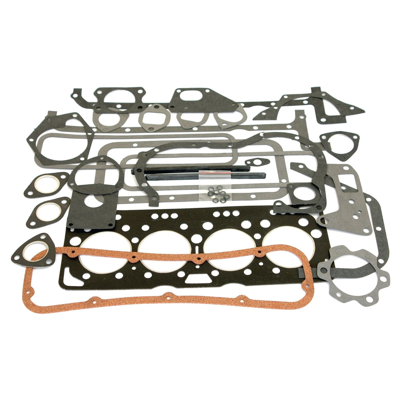 A Complete Gasket Set - 4 Cyl. (Sparex Part No. S.59065) from Sparex, along with various other automotive gaskets and seals, laid out on a white background.