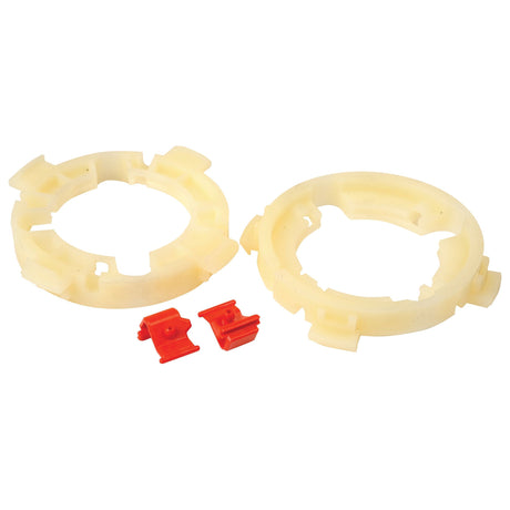 Two beige plastic rings and two small red clips are set against a plain white background. The rings, each 67mm in diameter, have notched edges and openings, resembling components of the Sparex PTO EasyLock Bearing (X/Large) 2 x 67mm, Sparex Part No.S.59627 for a mechanical assembly.