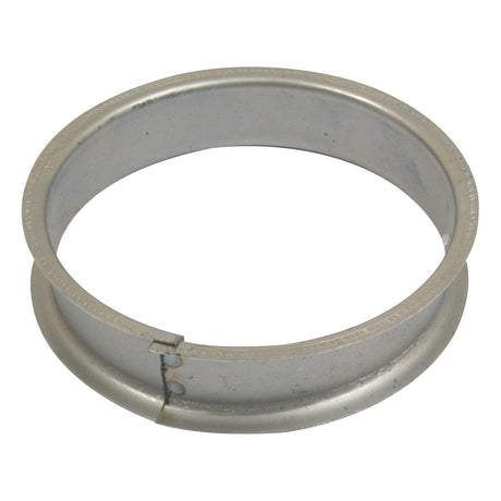 A Brush Spacer from Sparex, measuring Ø127mm (5'') x 30mm and fitting model S0033 (Sparex Part No. S.59774), is a metal ring designed as a connector or support piece, likely employed in ductwork or machinery to provide added stability.