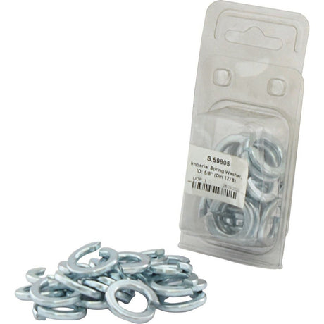 A plastic package of Sparex imperial spring washers, zinc-plated with an ID of 5/8" (DIN 127B Standard), containing 20 pieces. Additional washers are scattered in front of the package. The label reads "Imperial Spring Washer 5/8'' (DIN | Standard No. DIN 127B), 20 pcs. Agripak | Sparex Part No.S.59805.