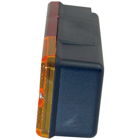 A black, rectangular Rear Combination Light from Sparex with highlighted amber and red sections, viewed from the side. This 12V halogen light functions as a brake light, tail light, and indicator on both right-hand and left-hand sides.