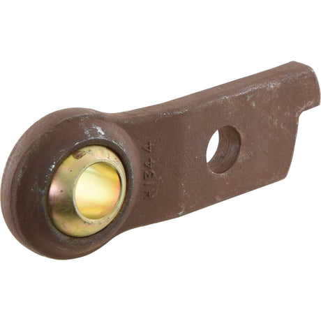 A metal lever component known as the *SPECIAL PRICE* - Lower Link Weld On Ball End (Cat. 2) RH by JMCE DEALS, featuring a circular brass bushing and a hole near one end. The surface is dark brown with a textured, slightly rusted appearance, reminiscent of parts used in Massey Ferguson tractors. Sparex Part No.S.60025.