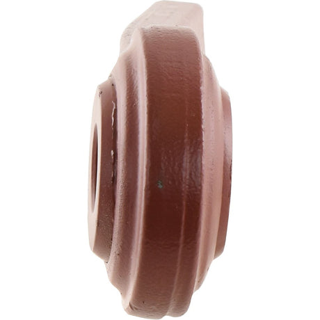 Close-up of a Lower Link Weld On Ball End (Cat. 1) LH (Sparex Part No.S.60447) by Sparex, showcasing its brown, round mechanical design with a central hole and flat extension, coated in Red Oxide for enhanced durability.