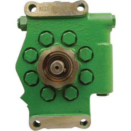 Close-up of a green industrial mechanical part, featuring multiple bolts and a central circular component. The top of the part is inscribed with a series of numbers and letters, highlighting its role in housing the keyed shaft. This component is known as the Hydraulic Pump from Sparex, with Part No.S.60551.