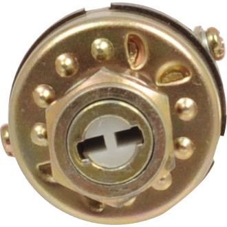 Close-up of the gold-colored Ignition Switch | Sparex Part No. S.60820, featuring a cross-shaped key slot, specifically designed for Massey Ferguson tractors. This switch has 4 positions and is compatible with Sparex components.