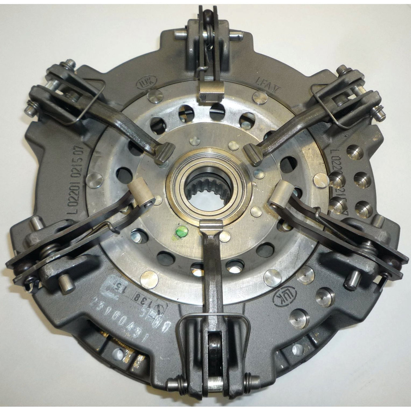 A close-up image of a metallic automotive component identified as the Clutch Cover Assembly - S.61202 by Sparex, featuring intricate mechanisms and springs within its Cast Iron Housing.