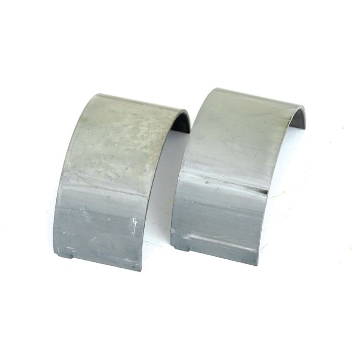 Two curved, metallic bearing shells from Sparex, specifically the Conrod Bearing Std. Pair (Sparex Part No. S.62045), are positioned side by side on a white background.