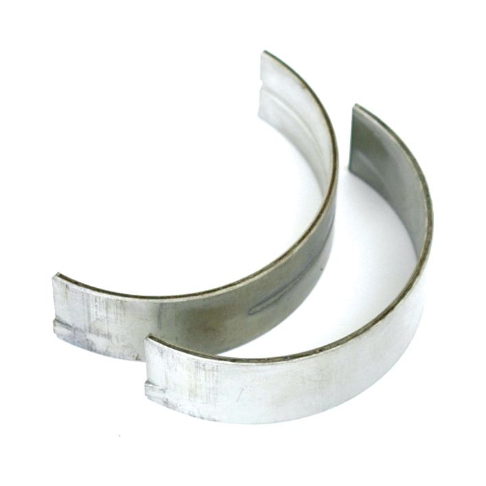 Two semi-circular, metallic engine bearings from Sparex, specifically the Main Bearing Std. (Pair), compatible with Fiat or Case IH / International Harvester models, placed side by side against a white background.