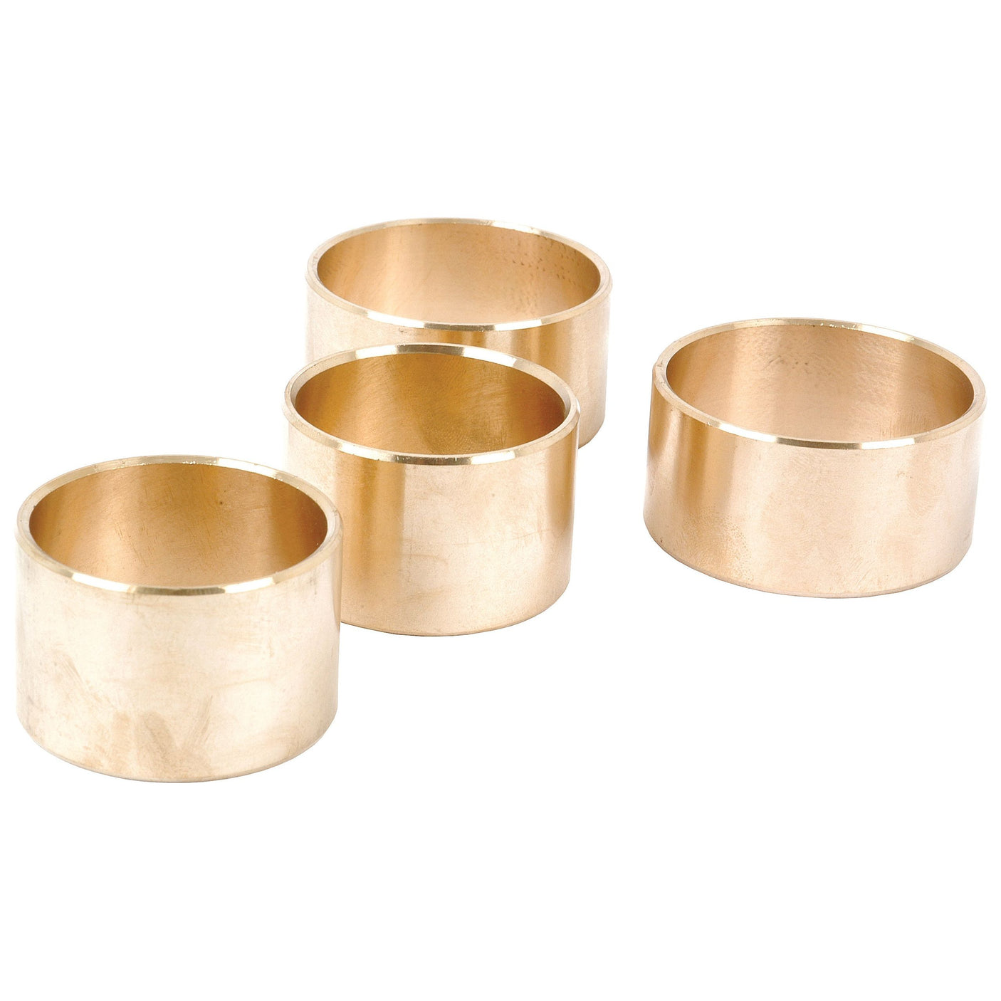 Four gold-colored, cylindrical napkin rings arranged in a staggered formation, reminiscent of the precision you'd find in a well-organized Sparex Bush Kit (Part No. S.62271).