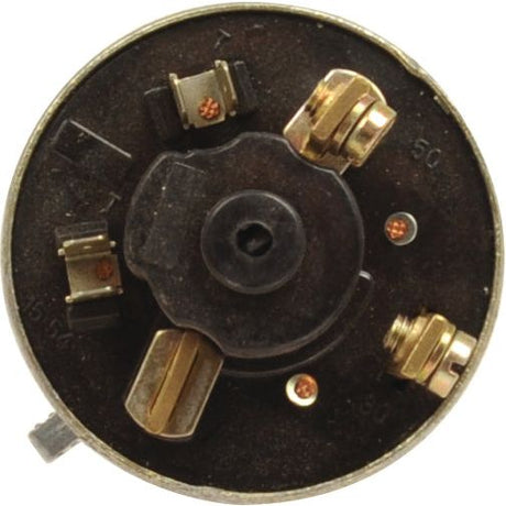 A close-up view of a round, dark-colored Ignition Switch by Sparex (Sparex Part No. S.62278), featuring various metal connectors and screws attached, suitable for a tractor.