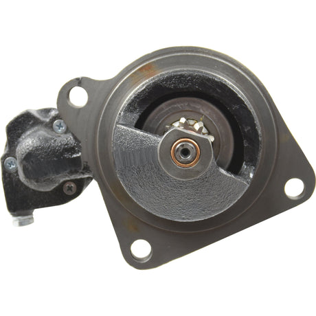 A close-up of a metal automotive part with mounting holes and a central rotating component, resembling the Sparex Starter Motor - 12V, 2.7Kw (Sparex Part No.S.62405).