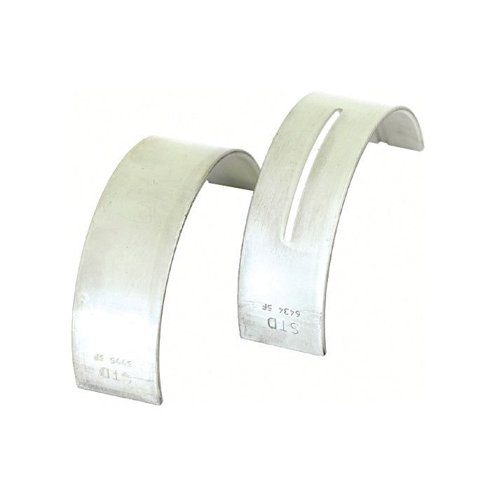 Two silver-colored machine bearings, one slotted and one solid, are displayed side by side on a white background. The +0.020'' (0.50mm) sizing of these Main Bearings (Sparex Part No.S.62453) is clearly visible, highlighting the precision of these essential Sparex components.