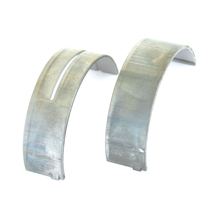 Two metal engine rod bearings, a slotted (left) and solid (right) piece, displayed on a white background—compatible with Fiat and Case IH models. Sold as Main Bearing +0.020'' (0.50mm) (Pair) under Sparex Part No.S.62454 by the brand Sparex.