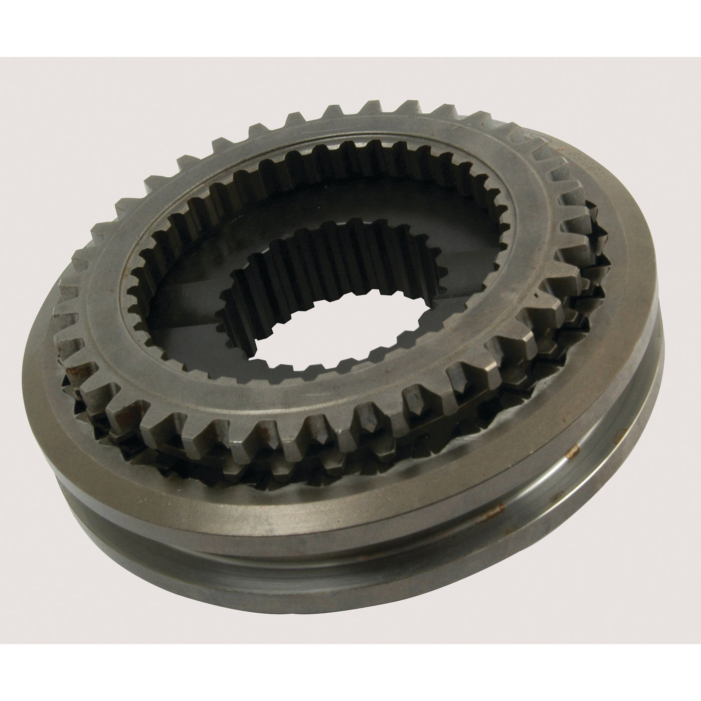 A Synchro Assembly (Sparex Part No. S.62684), with interlocking teeth reminiscent of a crucial component from Fiat tractor parts, is circular in shape and laying on a white background.