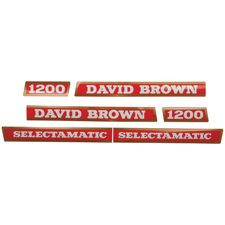 Image of six red nameplates with white text that read "1200," "DAVID BROWN," and "SELECTAMATIC." This Sparex Decal Set (Part No. S.63347) is designed specifically for the David Brown 1200 Selectamatic series, making it an ideal choice for enthusiasts and restorers.