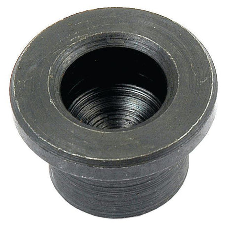 A close-up view of the Clutch Spacer (Sparex Part No. S.64009), a black, cylindrical metal bushing with a flanged top and a central, threaded hole, compatible with Zetor and Sparex parts—coded 8483308090.