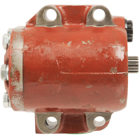 A worn, red, cylindrical mechanical part with bolts and holes, the Sparex Hydraulic Pump - S.64685 is designed for integration into larger machinery and is crucial for maintaining pump rotation.