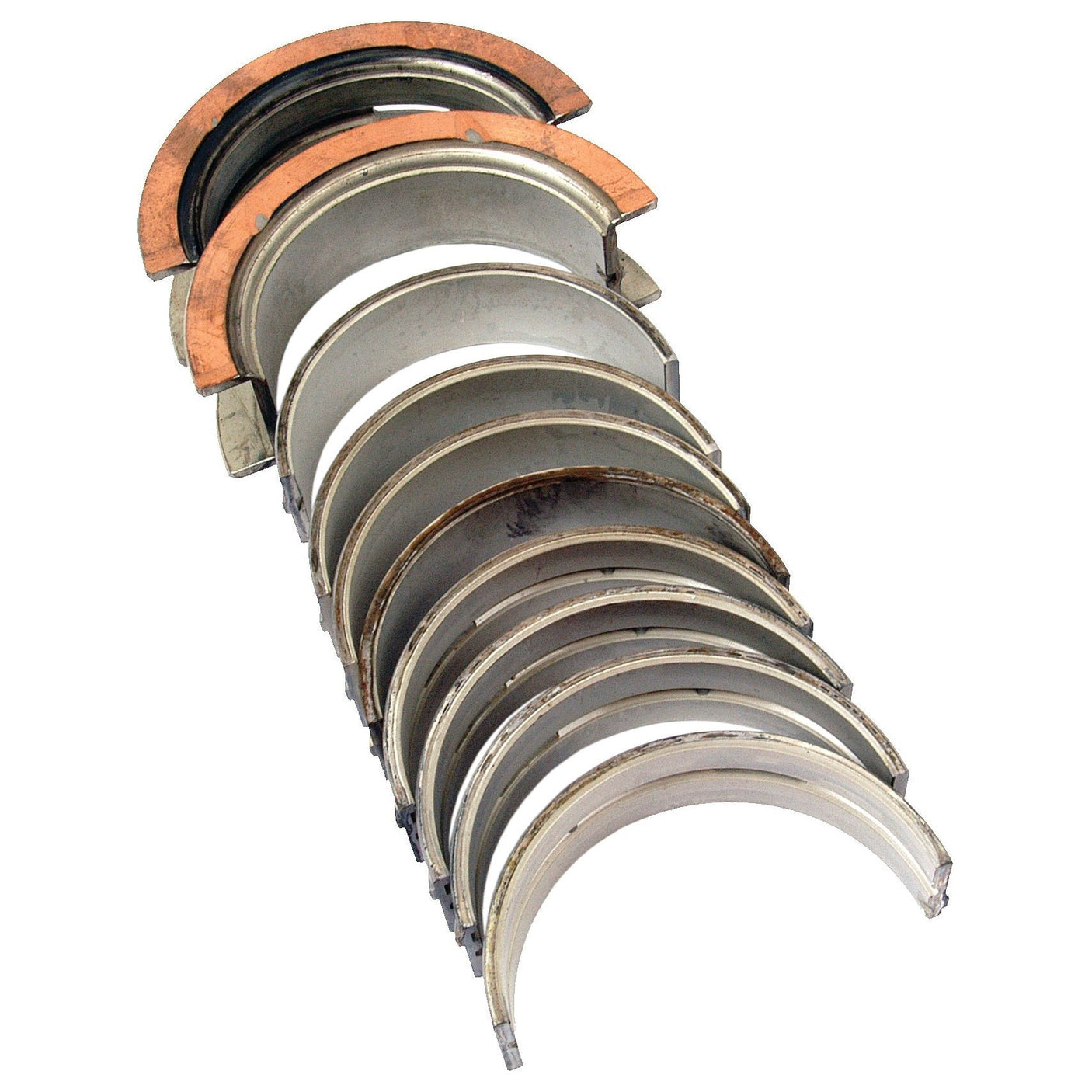 A set of Sparex Main Bearings +0.040'' (1mm) (Set) | Sparex Part No.S.65227, arranged in a semi-circular pattern, showing different stages of wear and use, reminiscent of those found in Ford New Holland or Case IH engines.