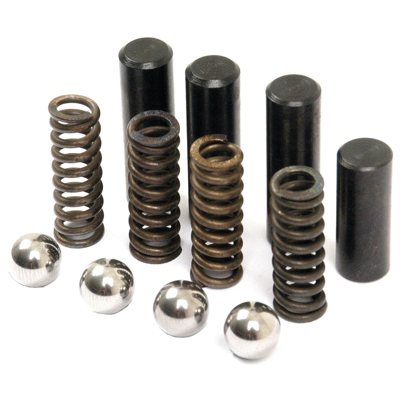 A collection of metal springs, cylindrical rods, and shiny metallic ball bearings, reminiscent of components found in a Gear Selector Kit for Ford New Holland or Case IH machinery, arranged meticulously in rows.