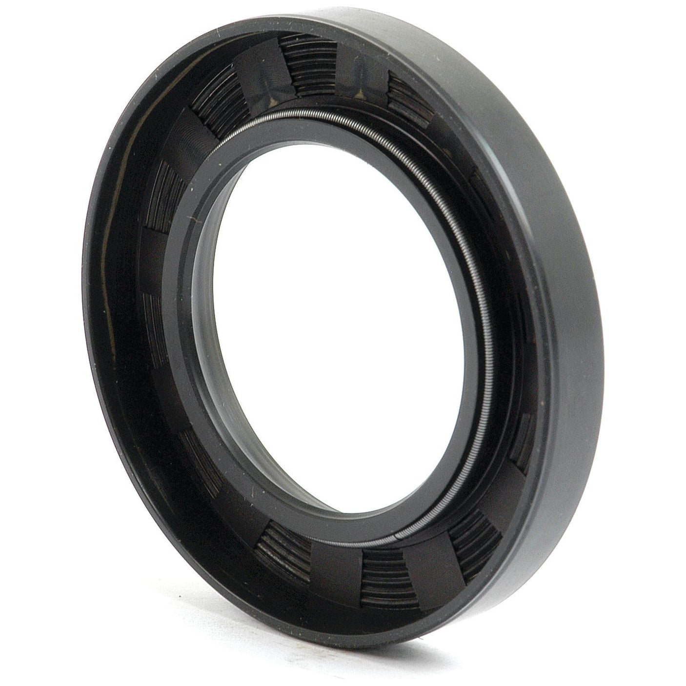 Close-up of a Sparex Imperial Rotary Shaft Seal, 2 1/8" x 3 1/2" x 1/2" Single Lip (Sparex Part No. S.65707) in black rubber and metal, showing the inner and outer circular components used for sealing gaps in Ford / New Holland machinery to prevent leaks.