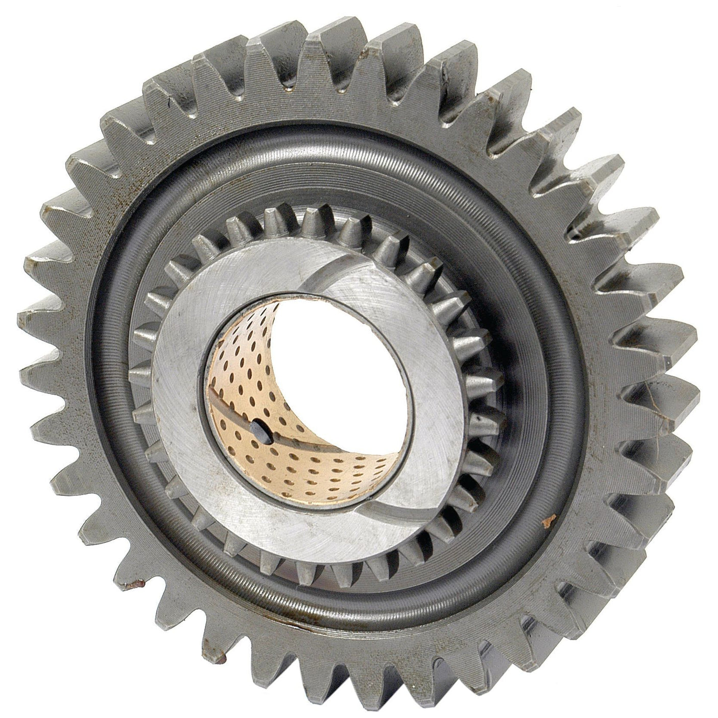 Close-up image of a single Sparex metal gear with interlocking teeth, featuring a cylindrical bearing in the center. Ideal for Ford New Holland machinery, available as Transmission Gear | Sparex Part No.S.65790.