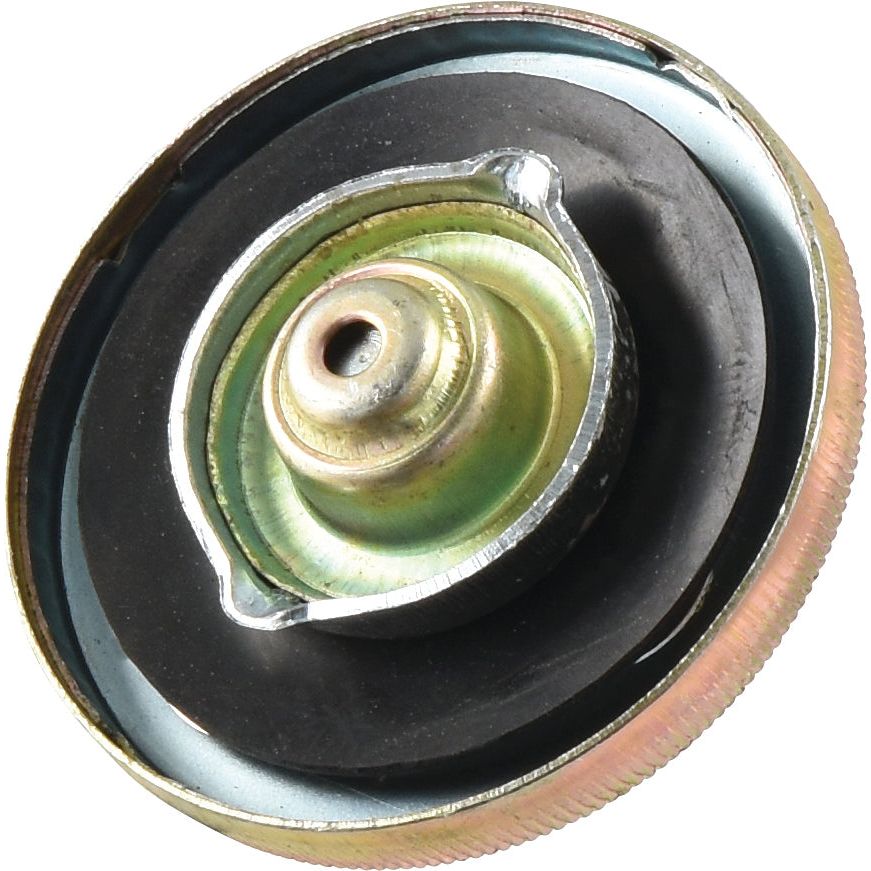 A close-up view of the Sparex Fuel Cap (S.65819) with a central valve and Metal Bayonet Internal design, surrounded by a robust rubber gasket.