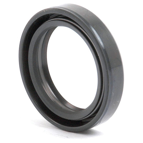 Close-up of a Sparex Metric Rotary Shaft Seal, 29 x 40 x 8mm (Sparex Part No. S.65870) with a smooth outer surface and a visible inner groove, placed on a white background, commonly used in New Holland tractors.