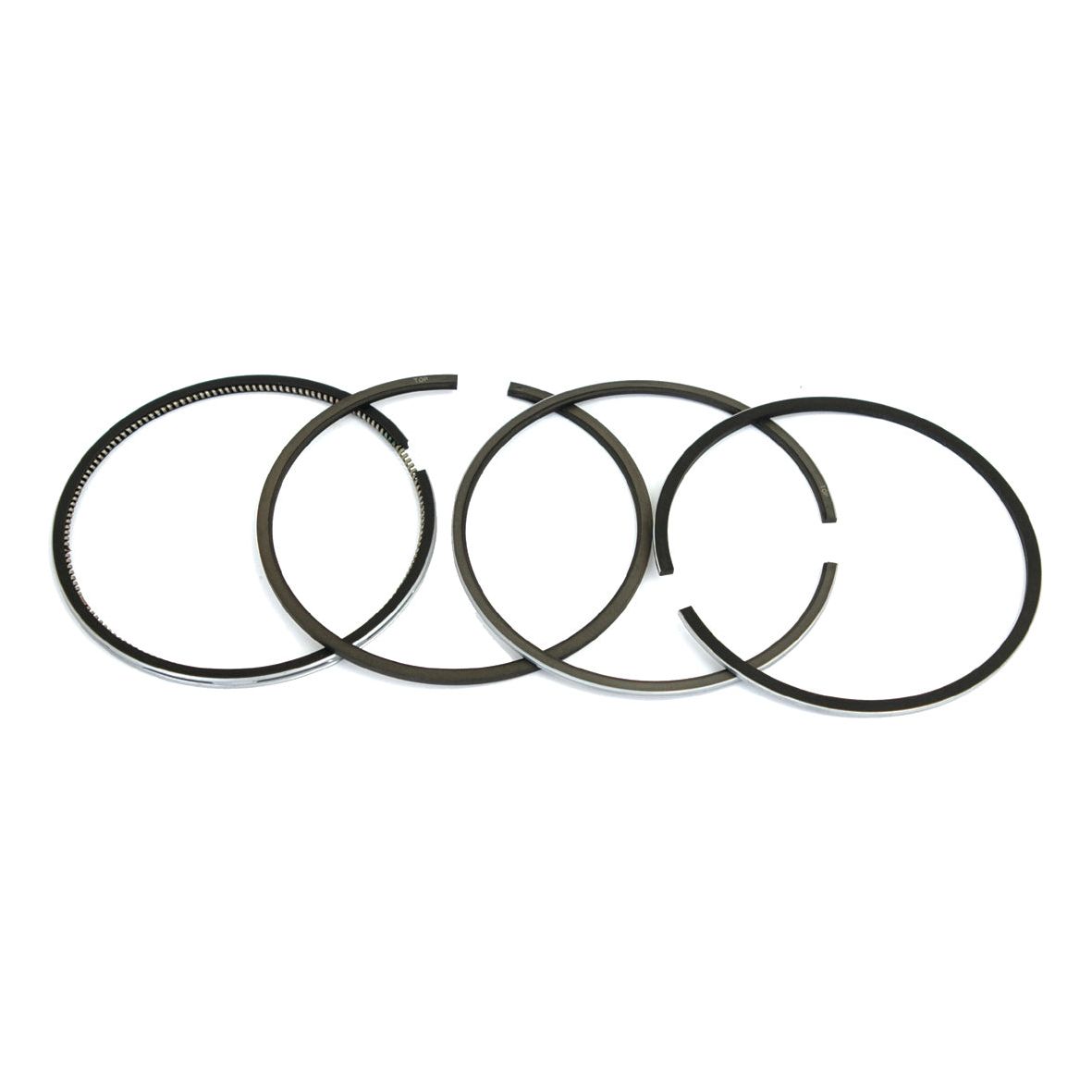 Four black piston rings arranged in a row on a white background. Each chrome-plated ring set, Sparex Part No. S.66066 (Piston Ring +0.040'' (1mm)), is of similar size and shape, ideal for Ford New Holland engines.