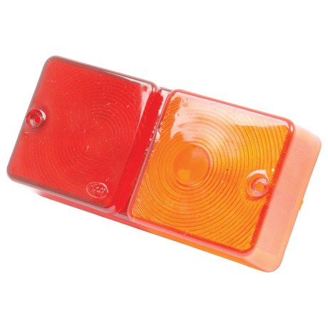 Close-up of a Sparex Replacement Lens, designed to fit S.65855 & S.65854 - S.66325, featuring a polycarbonate, red and amber rectangular rear light lens with two circular reflectors mounted side by side.