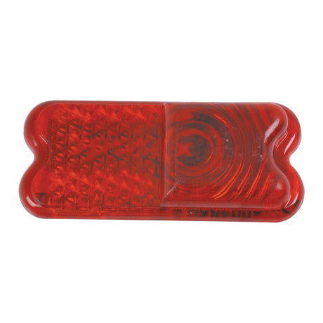 A Replacement Lens, compatible with S.66734 & S.66746 - S.66842 models from Sparex, is a rectangular red reflector with a textured surface and symmetrical rounded ends, crafted from durable polycarbonate for optimal longevity, ideal for use as a rear light component.