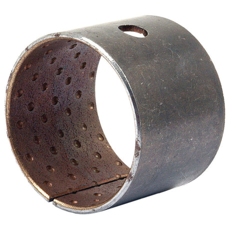 A Sparex Steering Bush, part number S.66942, designed with a cylindrical shape featuring perforations and a side hole for Ford/New Holland steering systems.