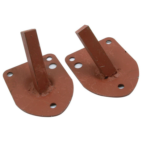 The Rear Light Bracket Set, Sparex Part No. S.67191, comprises two rust-colored metal brackets with flat bases, each equipped with multiple circular holes and short vertical extensions. These Sparex-compatible parts are ideal for RH & LH applications on Ford / New Holland machinery.