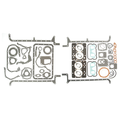 A Complete Gasket Set - 4 Cyl. by Sparex (Part No. S.67203) is displayed on a white surface, featuring an assortment of gaskets and seals in various shapes and sizes suitable for Universal Tractors and Long Tractor models.