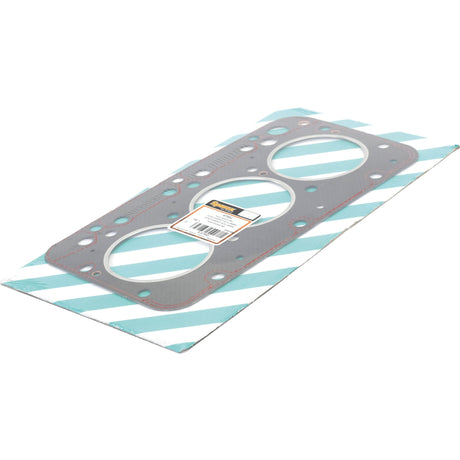 A Sparex Head Gasket for a 3-cylinder Fiat Tractor (Sparex Part No. S.67552), packaged in blue and white stripes.