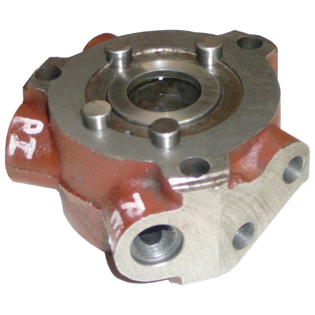 A close-up image of the Sparex Power Steering Valve Assembly (Part No. S.67889) with red and metallic components, featuring multiple bolts and threaded holes, showcasing the intricate design typical of Ford New Holland tractor parts.