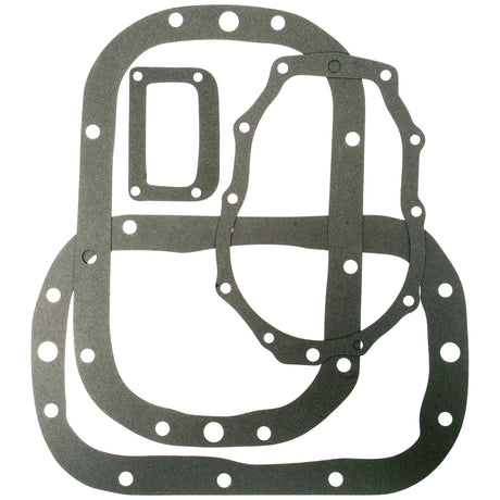 The Transmission Cover Gasket Set by Sparex, Part No. S.68190, includes gaskets in various shapes and sizes—such as oval, rectangular, and irregular forms—all featuring multiple bolt holes. This set is perfect for your Ford Dexta or Super Dexta.