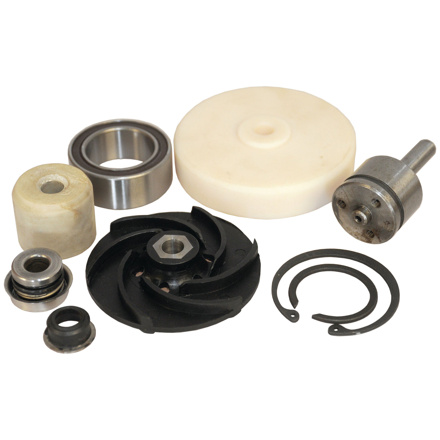 Assorted mechanical parts arranged on a white background, including bearings, a plastic disc, metal rings, and a black impeller from the Sparex Water Pump Repair Kit (Part No. S.69275) for John Deere.