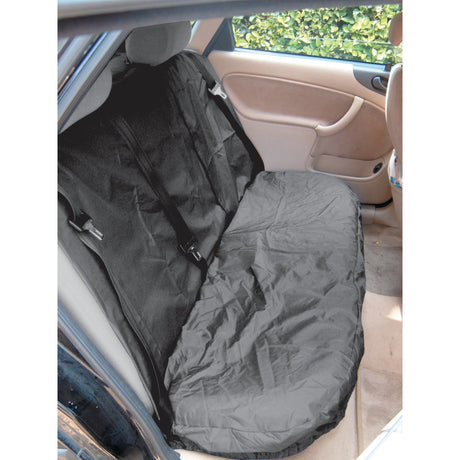 The rear seat of the car is covered with the Sparex Multi-Fit Rear Standard Seat Cover (S.71705), which sports a sleek black, waterproof design to protect against dirt and damage. Despite the beige seats and door panels, the interior remains impeccably clean. This universal-fit cover for cars and vans is not only easy to install but also conveniently washable.