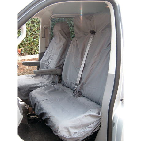 A vehicle interior featuring the Sparex Double Passenger Seat Cover, model S.71715, which is a universal fit for vans and offers gray, washable, and waterproof protection.