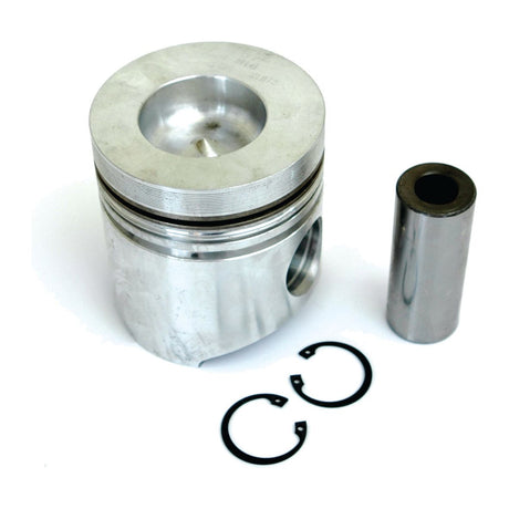 Image of the Sparex Piston (Standard) - S.72155 with two retaining rings and a cylindrical pin, placed on a white surface. The piston has a machined top, grooves along the sides, and showcases its precise compression height.