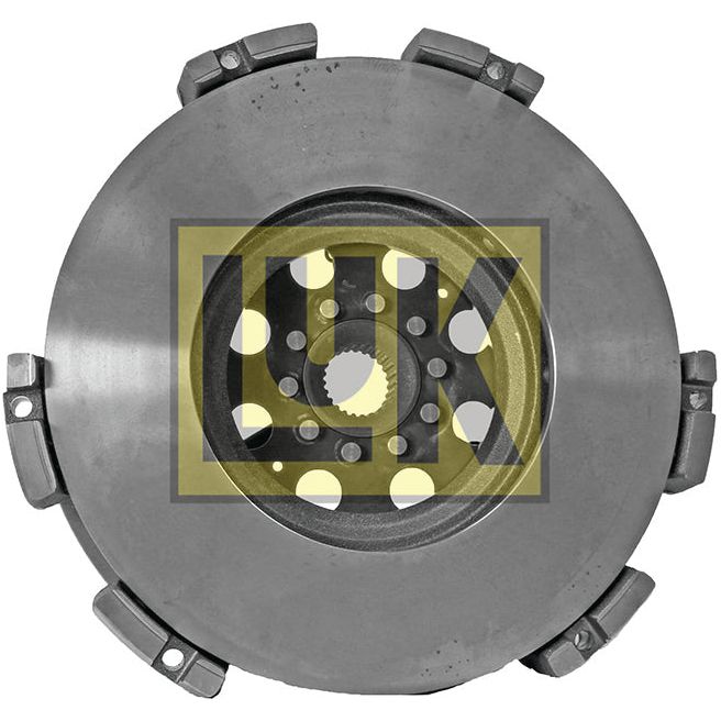 A close-up view of a circular mechanical component with a metal finish, visible gears, and bolts. Featuring the Sparex logo prominently in the center, this Clutch Cover Assembly - S.72591 integrates seamlessly with a cast iron housing for enhanced durability.