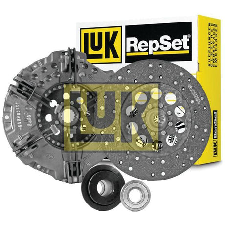 The Sparex Clutch Kit with Bearings - S.73065, which includes an organic disc, pressure plate, release bearing, and alignment tool, is displayed in front of the distinctive yellow and black packaging.