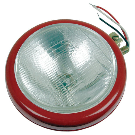 The Sparex Head Light (Halogen) RH & LH, Straight, 12V (Sparex Part No. S.73529) features a round, red housing with a clear, ridged lens cover, exposed wiring, and a metal mounting bracket, making it an ideal headlight for your vehicle.