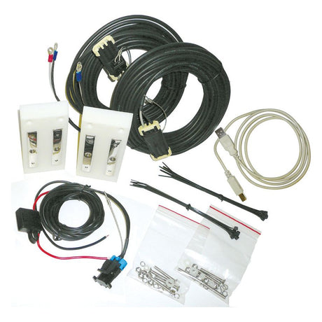 The BHT-2 Baler-Mounted Hay Moisture Tester (S.75748) by Sparex includes two coiled cables, two white control panels featuring multi-sensor technology, a USB cable, a black wired component, zip ties, and plastic bags with metal connectors and screws.