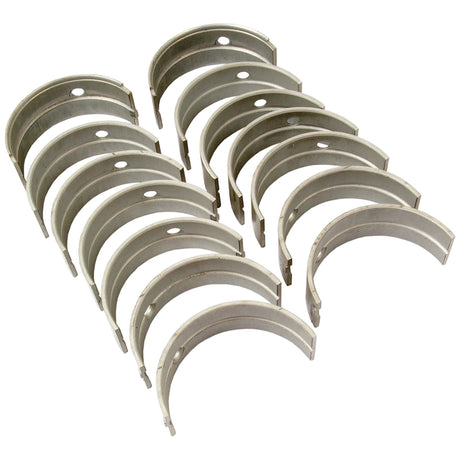 Close-up of sets of curved metal components, each pair forming a semicircular shape with small holes near the ends. These main bearing shells, labeled as Main Bearing +0.030'' (0.75mm) (Set), Sparex Part No.S.75814 by Sparex, are designed for John Deere engines.